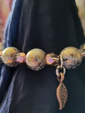 Stunning Gold Green Bead Wrist Wrap with Brass Leaf Charm
